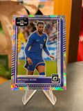 Michael Olise — Panini Donruss Optic Road to FIFA World Cup 2026 (No. 140), paralela Cracked Ice