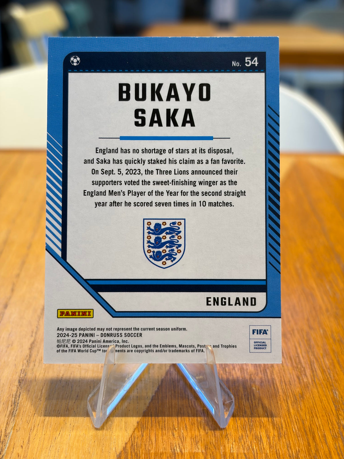 Bukayo Saka — Panini Donruss (No. 54), paralela verde azulada 180/199
