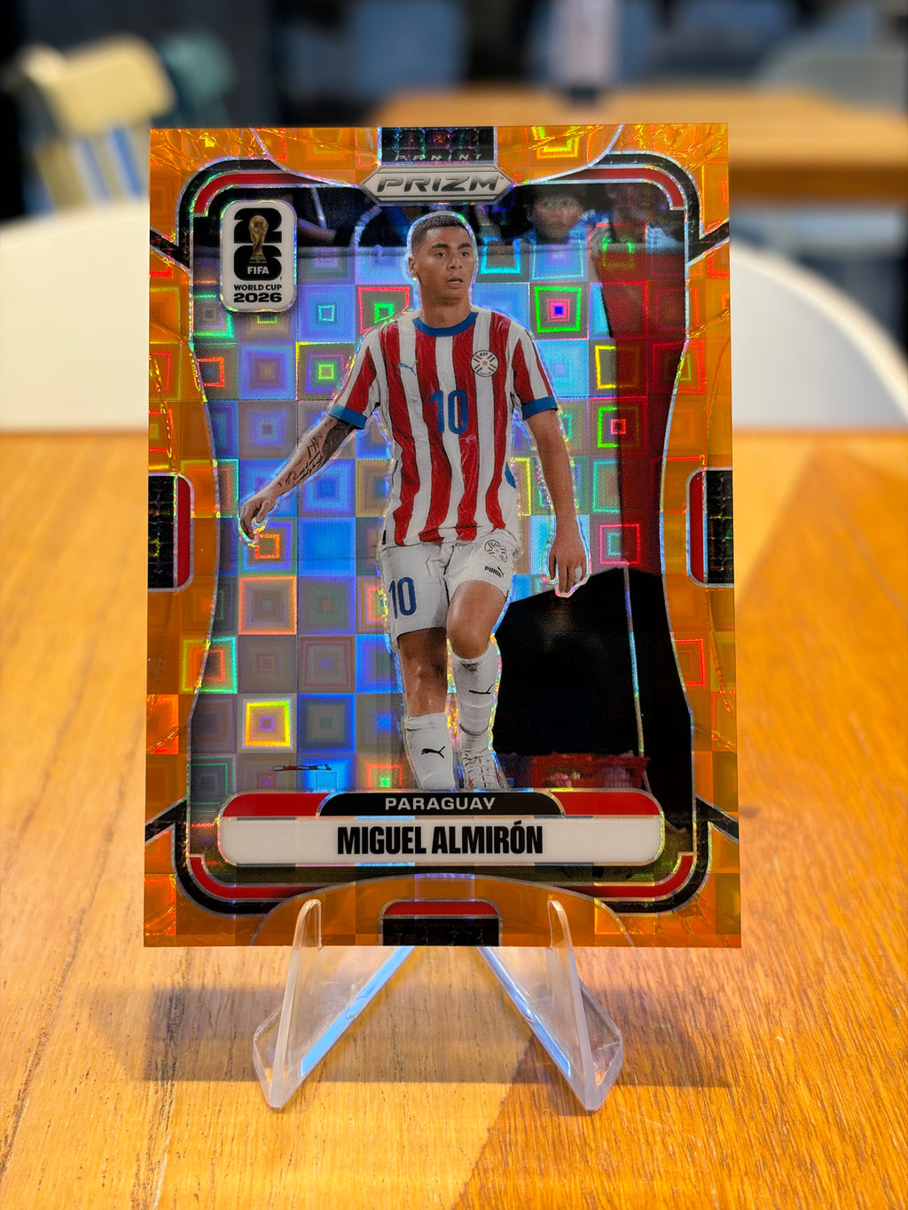 Miguel Almirón — Panini Prizm FIFA World Cup 2026 (No. 345), paralela Orange Pandora 190/215