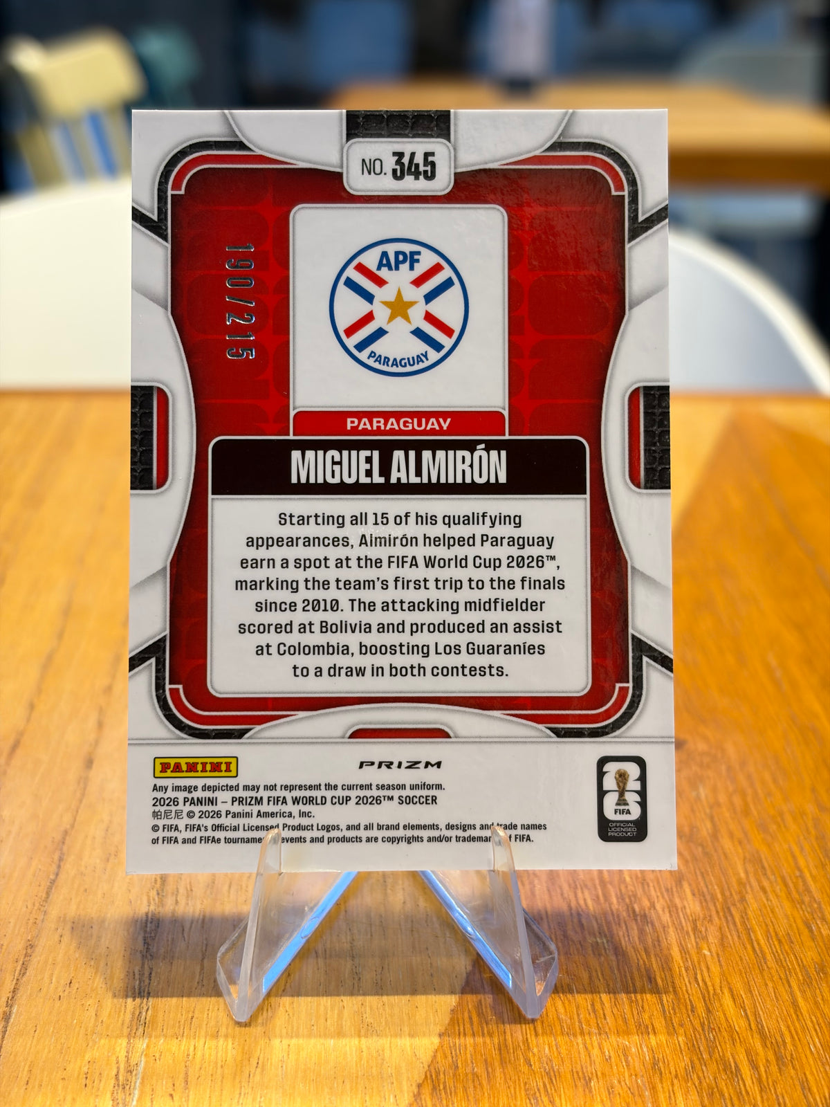 Miguel Almirón — Panini Prizm FIFA World Cup 2026 (No. 345), paralela Orange Pandora 190/215